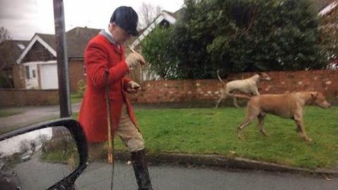 Huntsman and dogs in Macclesfield street