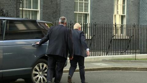 PM enters Downing Street