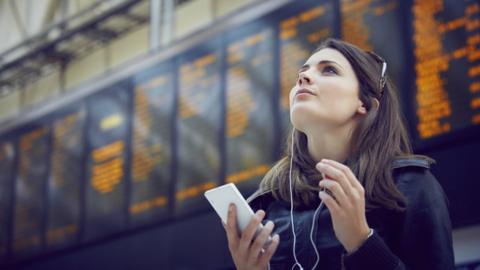 Woman at train station