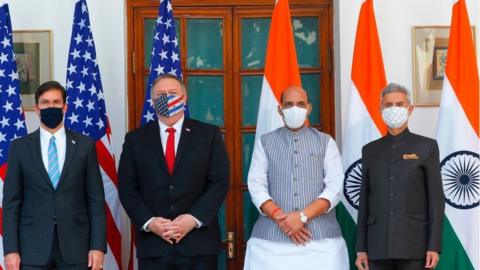US Secretary of State Mike Pompeo (2nd L), US Secretary of Defence Mark Esper (L), India's Defence Minister Rajnath Singh (2nd R) and India's Foreign Minister Subrahmanyam Jaishankar pose for pictures before their meeting at Hyderabad House in New Delhi on October 27, 2020.