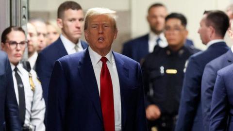 Former president Donald Trump arrives for a hearing at Criminal Court on March 25, 2024 in New York City.