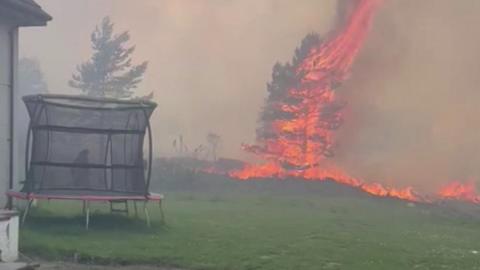 Daviot wildfire burns in the back garden of house