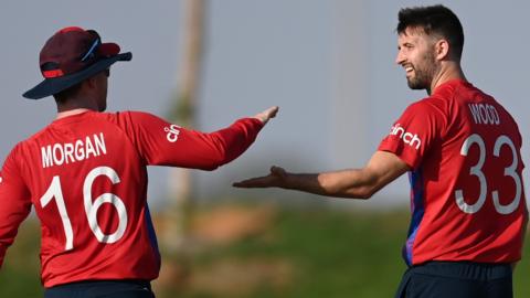 Eoin Morgan and Mark Wood