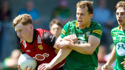 Meath's Ronan Jones challenges Down's Odhran Murdock during the group-stages Tailteann Cup contest between the counties last month