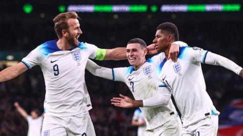 England players celebrate scoring against Italy