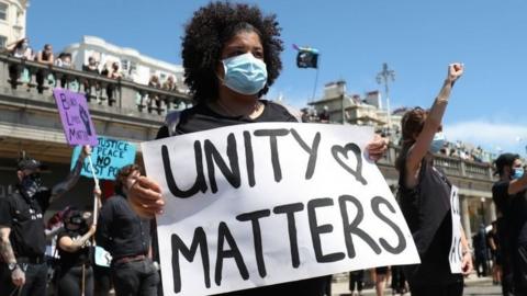 A Black Lives Matter protester in Brighton