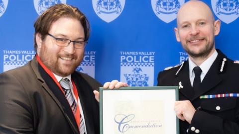 Chris Geraghty is commended by Chief Constable Jason Hogg