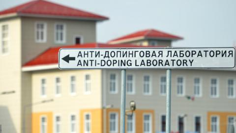 A sign shows the direction to the anti-doping laboratory of the 2014 Winter Olympic Games