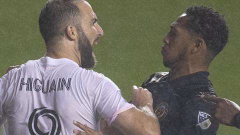 Gonzalo Higuain is involved with a confrontation with Philadelphia players after his penalty miss