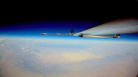 Solar powered plane flies over the Earth