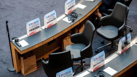 Empty seats after Austrian MPs from the right-wing Austrian Freedom Party (FPOe) left the assembly room