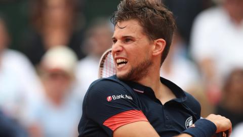 Dominic Thiem hits a shot