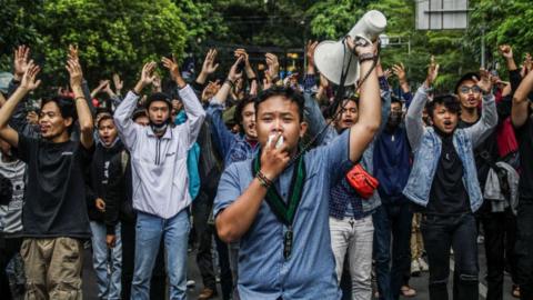 Protestors outside parliament on Tuesday.