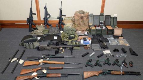 A cache of guns and ammunition uncovered by US federal investigators in the home of Coast Guard lieutenant Christopher Paul Hasson in Silver Spring, Maryland. on February 20, 2019