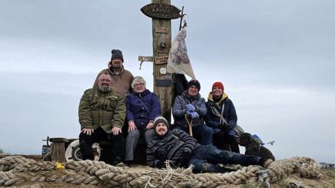 Buck Beach Bench restored after storms