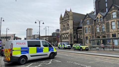 March: Police vehicles at Churchill Way