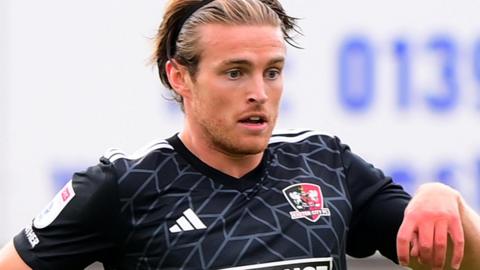 Kyle Taylor playing for Exeter City