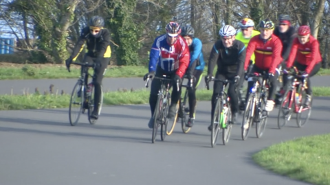 Cyclists at a velodrome