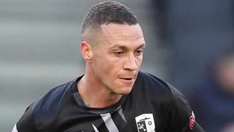 James Chester playing for Barrow