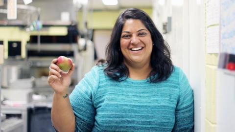 Chef Joshna Maharaj standing in a kitchen