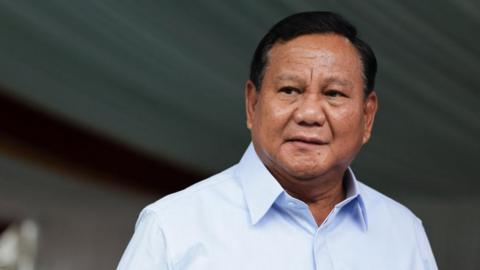 Indonesia's presidential candidate Prabowo Subianto looks on after voting in Indonesia's presidential and legislative elections at a polling station in Bogor,