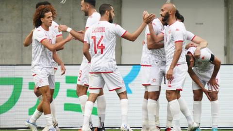 Tunisia players celebrate