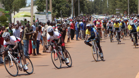 Cyclist ride through Kigali during the Tour of Rwanda