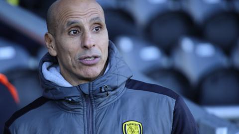 Burton boss Dino Maamria on the touchline