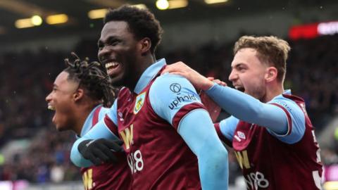 David Datro Fofana celebrates with his Burnley team-mates after scoring against Brentford in the Premier League
