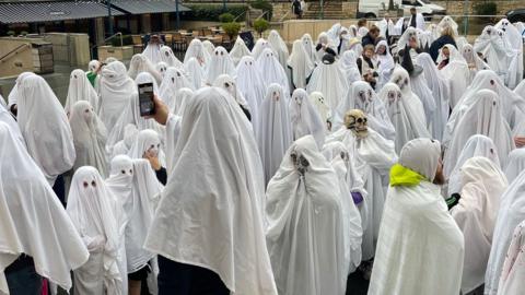 People dressed as ghosts in Dorchester