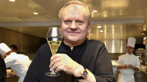 French chef Joel Robuchon poses for photographs in the kitchen of the Hotel de Ville in Crissier, Switzerland, on 17 December 2013