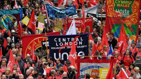 Demonstrators gather in London for a protest organised by the Trades Union Congress