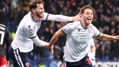 Bolton celebrate a goal against Exeter City