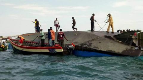 Rescuers at the scene of the capsized ferry