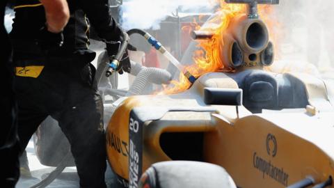 Kevin Magnussen's Renault catches fire