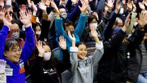 People in Sagamihara celebrate the spacecraft landing on the Moon