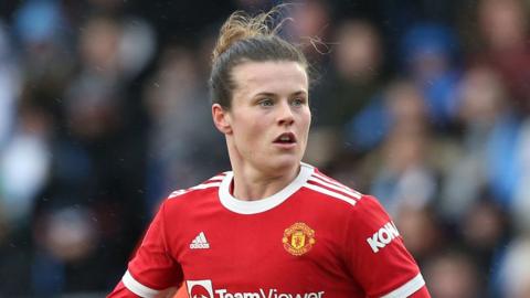 Manchester United footballer Hayley Ladd looks to the right