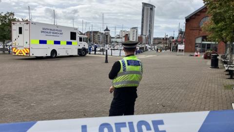 Police presence at Swansea Marina after car enters water