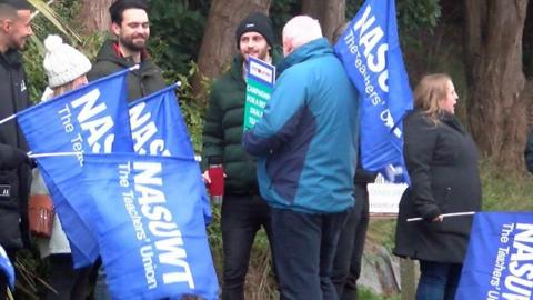 Members of the NASUWT taking strike action
