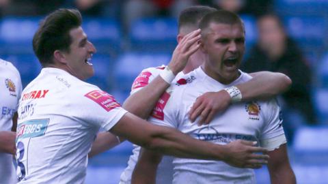 Henry Slade celebrates