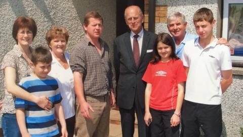 The Reed family with the Duke of Edinburgh when he visited the herd