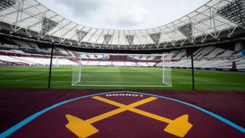 File photo showing a wide view of the interior of the stadium with West Ham's logo printed on the pitch