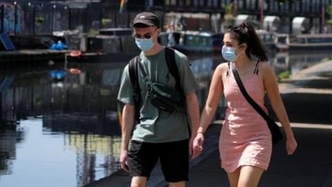 Couple wearing face masks in London (09/05/20)