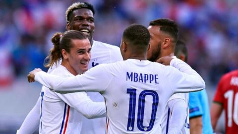 France players celebrate Antoine Griezmann's opener