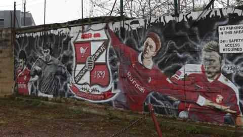 A mural outside Swindon Town's County Ground stadium