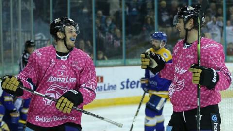 Belfast Giants players celebrate scoring