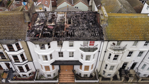 Drone shot shows the extent of damage to the roof of the building