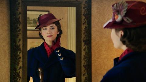 Mary Poppins looking in a mirror