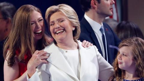 Hillary Clinton and her daughter embrace