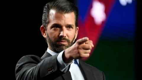 Donald Trump Jr pointing during a speech